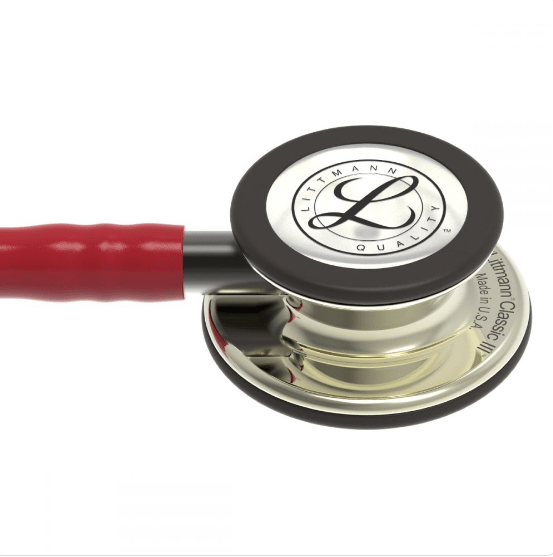 Estetoscopio Littmann Classic III con tubo color champán-burdeos, diseño profesional para diagnóstico médico.